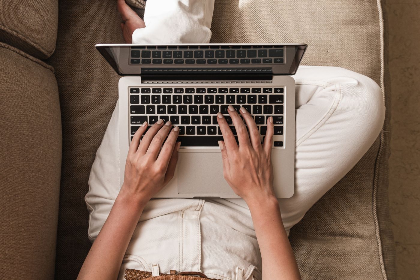 Course creator building a course on Kajabi using gorgeous templates from Just Add Your Brand Kajabi Template Shop