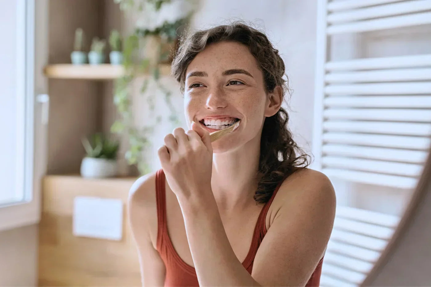 woman making marketing a habit, like brushing your teeth