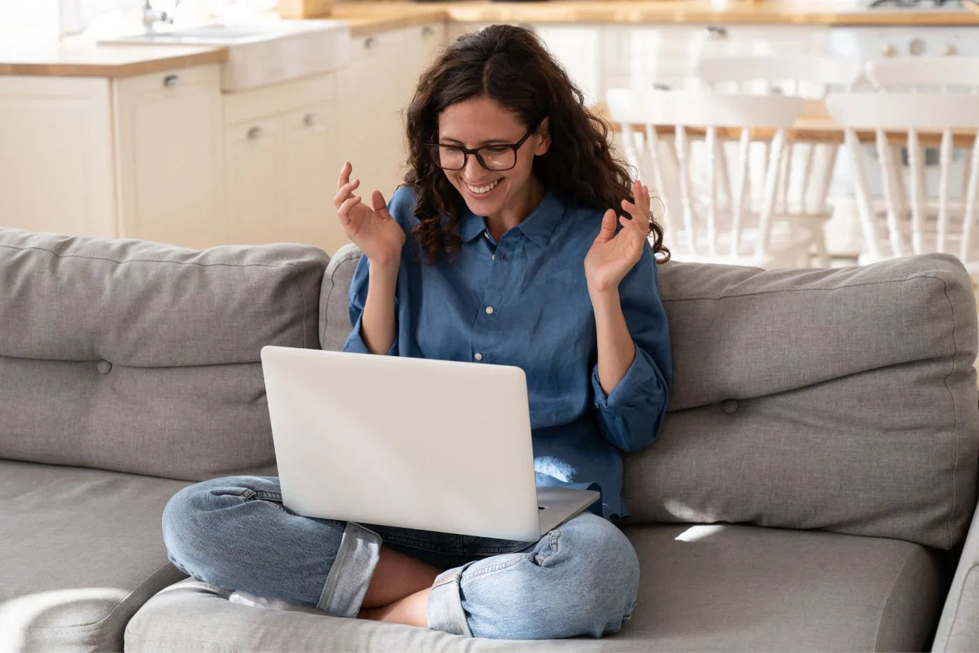 woman happy and excited about her recent online course purchase