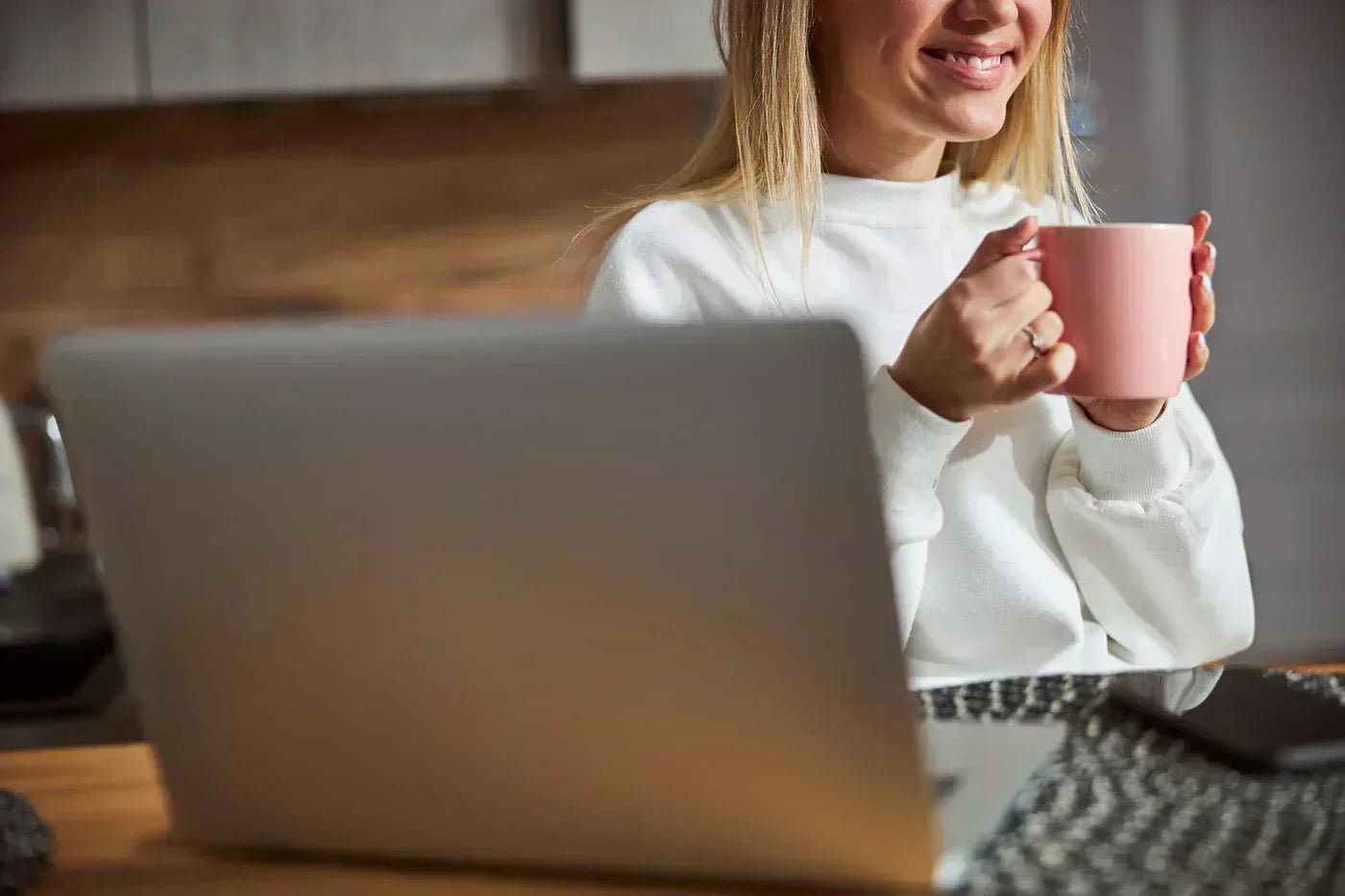 Female entrepreneur reading about top selling digital products and how to create her own digital product